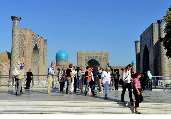 How many tourists visited Uzbekistan in 9 months?
